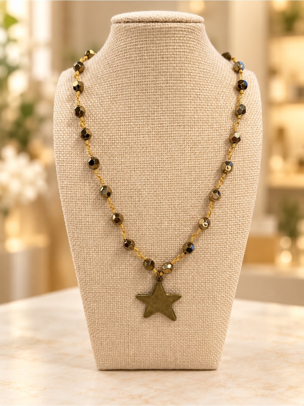 Talus bronze star necklace